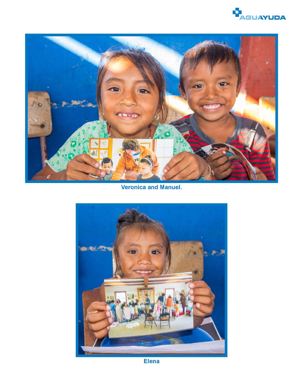 Aguayuda chidren posing with pictures of THFM children